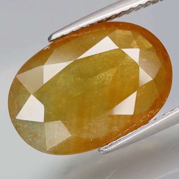 Very rich 7.45ct canary greenish orange Sapphire!