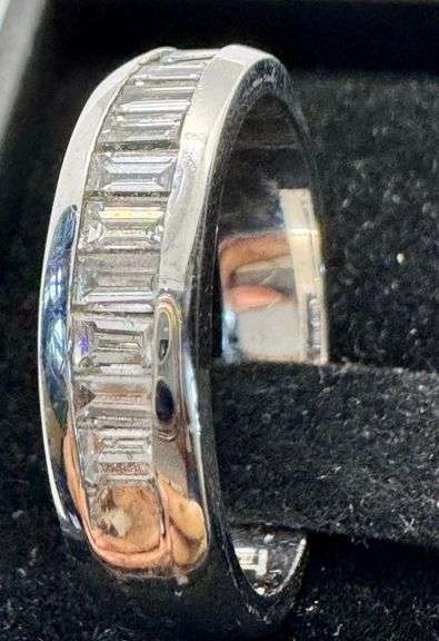 Platinum Emerald Cut Diamond Ring