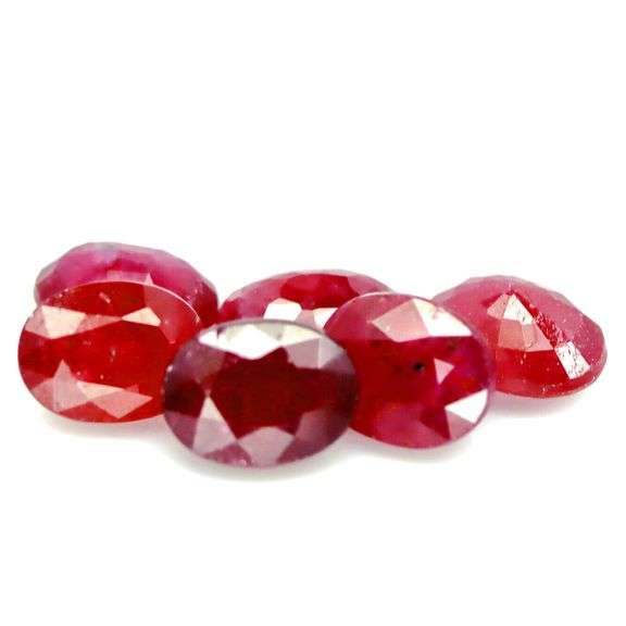 Heavy 10.90ct oval cut Ruby set