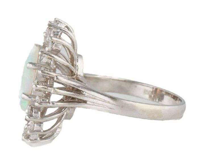 Marquise Opal and 0.60ctw Diamond Sun Beam Frame Ring in 14K