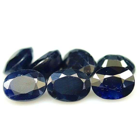 Heavy 14.02ct midnight blue Sapphire set