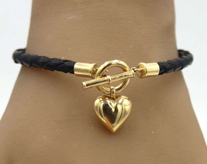 Black cord twisted bracelet with 14kt yellow gold heart shaped charm and toggle clasp
