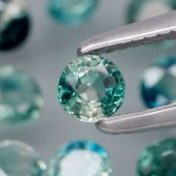 Heated only! 4.38ct blue green Sapphire set