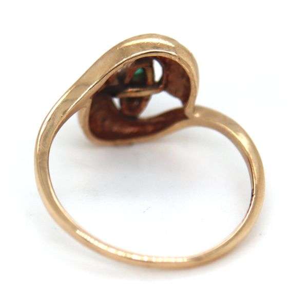 14kt Yellow gold emerald and diamond bypass ring
