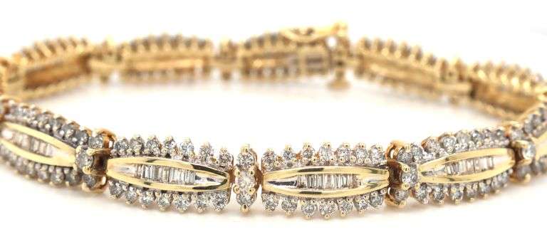 14kt Yellow gold 5.25ctw baguette and round diamond bracelet