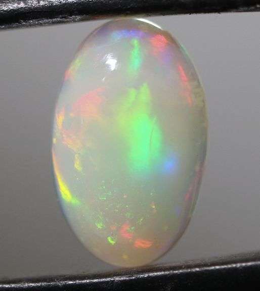 Lusterous 1.66ct multi pattern flashing Ethiopian Opal