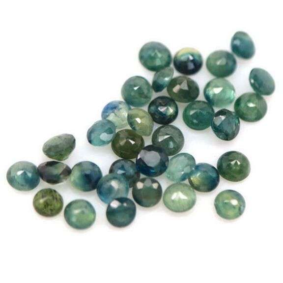 Heated only! 7.09ct bluish green sapphire set