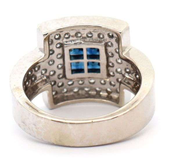 14kt White gold princess cut sapphire and pave diamond ring