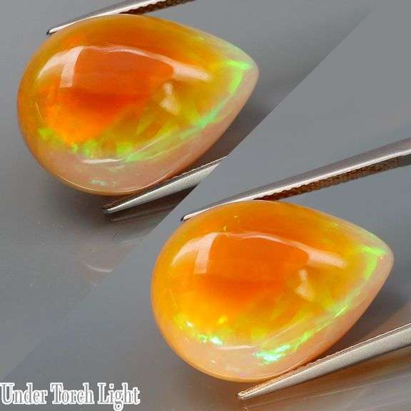 Exceptional 13.17ct full body flashing Semi Black Opal