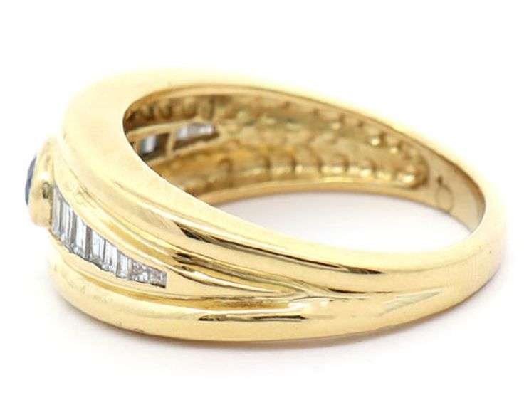 18kjt Yellow gold 0.50ct Oval Sapphire and 0.45ctw Baguette Diamond Ring