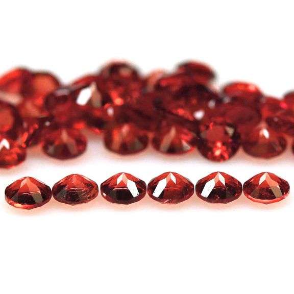 Superb 5.10ct diamond cut Padparadscha Garnet set