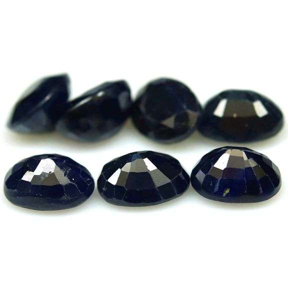 Heavy 14.02ct midnight blue Sapphire set