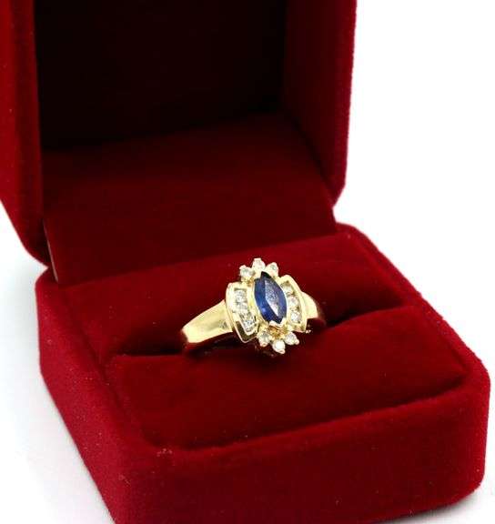 14kt White gold marquise blue sapphire and diamond Ring