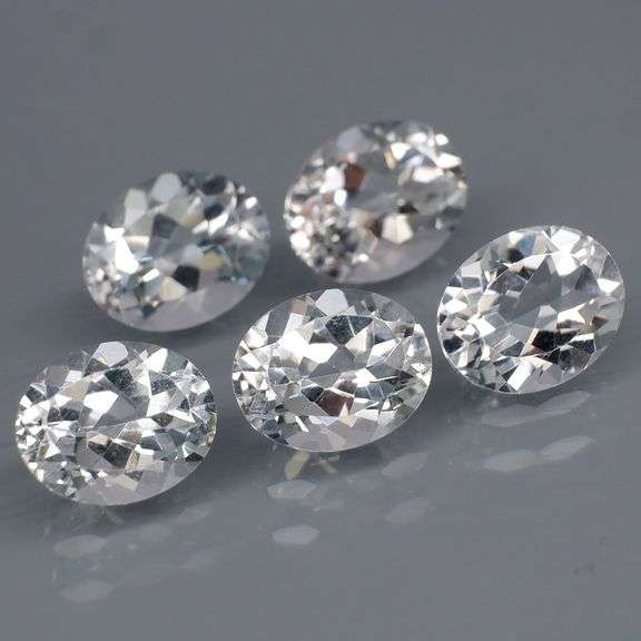 5 high fire diamond white Topaz weighing 3 carats each!