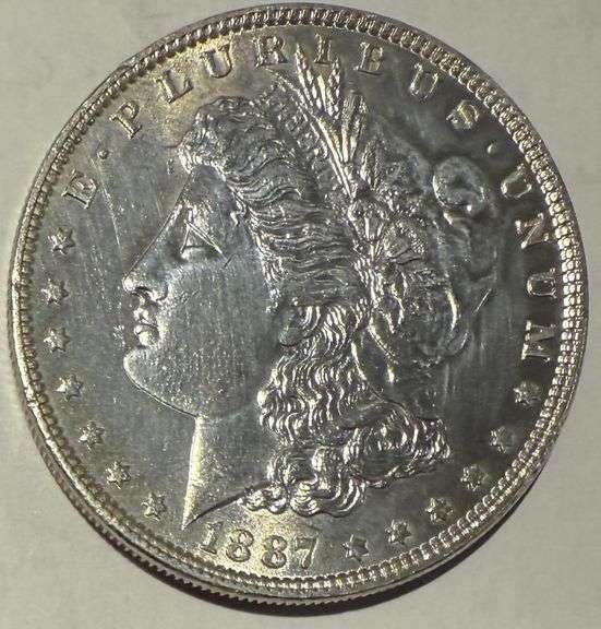 1887 BU Raw Frosty White Morgan Dollar