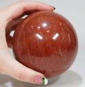 Attention grabbing 5,305ct Red Jasper sphere