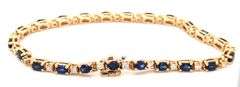 14kt Yellow gold oval blue sapphire and diamond bracelet