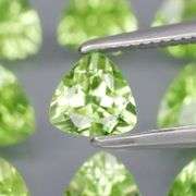 Fantastic 4.32ct 5x5mm trillion cut Peridot set