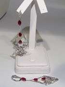 Opulent 18K White and Yellow Gold Chandelier Earrings with 4 Natural Rubies and 1.18 ct Diamond Acce
