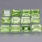 Brilliant 5.50ct 12pc set of matched baguette cut Peridot