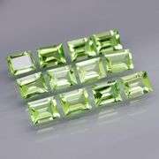 Brilliant 5.50ct 12pc set of matched baguette cut Peridot