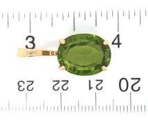 14kt Yellow gold oval peridot pendant