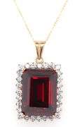 Emerald cut synthetic ruby and CZ halo frame pendant on chain in yellow gold