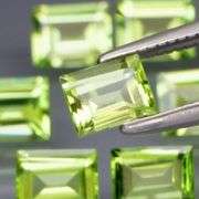 Brilliant 4.70ct 10pc set of matched baguette cut Peridot