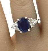 14kt White gold 2.50ct oval blue sapphire and diamond ring