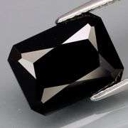 Elegant 7.20ct silky black Loas Tektite
