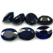 Heavy 14.02ct midnight blue Sapphire set