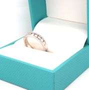 14kt White gold diamond channel set band