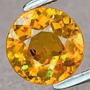 Premium grade 1.45ct heavy rainbow flashing Sphene