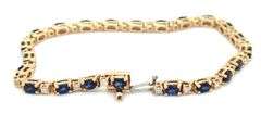 14kt Yellow gold oval blue sapphire and diamond bracelet