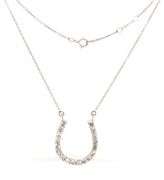 14kt White gold 0.75ctw diamond horse shoe pendant on chain