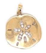 14kt Yellow gold diamond round pendant