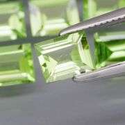 Brilliant 5.50ct 12pc set of matched baguette cut Peridot