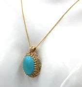 14kt Yellow gold large turquoise and diamond accent pendant on chain