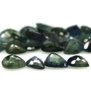 Stunning blue green 8.53ct pear cut Sapphire set