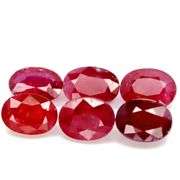 Heavy 10.90ct oval cut Ruby set
