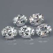 5 high fire diamond white Topaz weighing 3 carats each!