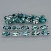 Stunning blue green 5.33ct marquise cut Sapphire set