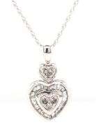 10kt White gold baguette and round diamond heart shaped pendant on chain