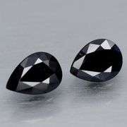 Elegant 1.67ct matched pair of midnight blue Sapphires