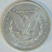 Creamy-white scarce 1891-O Morgan Silver Dollar. AU58+