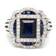 Platinum baguette and princess cut sapphire and single cut diamond halo art deco style ring