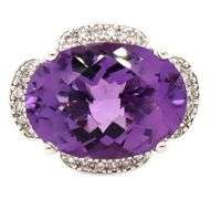 14kt White gold oval amethyst and diamond frame ring