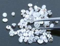 High fire .90ct set of round brilliant Diamonds!