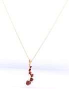 14kt Yellow gold garnet journey pendant on chain necklace