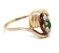 14kt Yellow gold emerald and diamond bypass ring